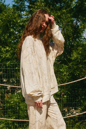 BUCKET LIST Women's Top Camouflage Oversized Mock Neck Sweatshirt